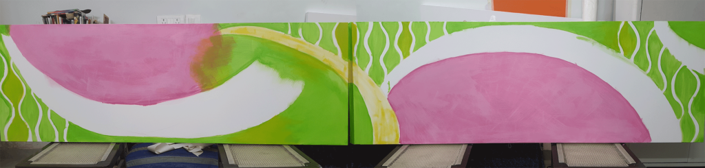 Colour blocking the canvases with bright green and pink.